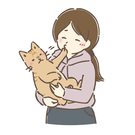 猫を可愛がろうとして嫌がられる女性