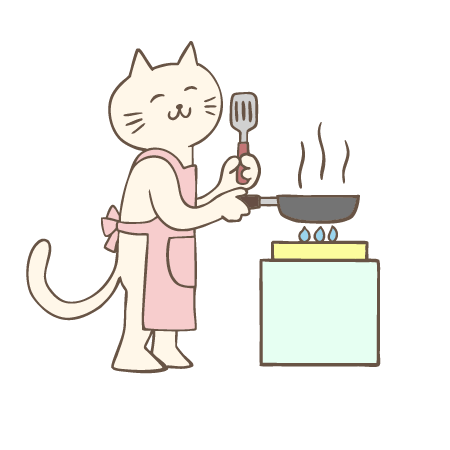 フライパンで料理をする猫