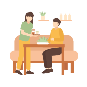 おしゃれな空間でお茶をする夫婦